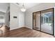 Open dining area with sliding glass doors leading to a screened patio and pool at 13125 Jessica Dr, Spring Hill, FL 34609