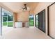 Enjoy outdoor living with this large covered patio with an outdoor kitchen at 13125 Jessica Dr, Spring Hill, FL 34609
