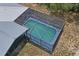 Aerial view of screened-in pool featuring a calming space for relaxation at 13345 Convent Garden Rd, Brooksville, FL 34613