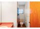 Bathroom with sink, vanity, toilet, and bathtub/shower combo at 13345 Convent Garden Rd, Brooksville, FL 34613