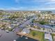 Waterfront community featuring convenient canal access, boat docks, and serene water views from above at 13836 Darlene Ave, Hudson, FL 34667