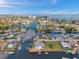 Waterfront community featuring convenient canal access, boat docks, and serene water views from above at 13836 Darlene Ave, Hudson, FL 34667