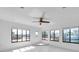 Bright bonus room with many windows overlooking a canal and backyard at 13836 Darlene Ave, Hudson, FL 34667