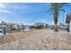 A wide wooden dock overlooking the canal with a boat lift at 13836 Darlene Ave, Hudson, FL 34667