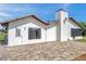 Charming home exterior with a side patio and well maintained landscaping at 13836 Darlene Ave, Hudson, FL 34667