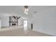 Spacious room with stone fireplace and eat-in kitchen at 13836 Darlene Ave, Hudson, FL 34667