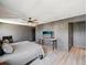 Relaxing bedroom featuring a comfortable bed, TV, and neutral decor, perfect for unwinding after a long day at 14000 Lugano Ct, Hudson, FL 34669