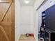 Mudroom with barn door and storage at 14000 Lugano Ct, Hudson, FL 34669