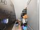 Storage room with pegboard wall and shelving for organization at 14000 Lugano Ct, Hudson, FL 34669