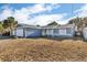 Inviting single-story home with a garage and a welcoming entrance at 15950 Adobe Dr, Hudson, FL 34667