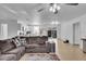 Open living room into kitchen with sliding glass doors at 15950 Adobe Dr, Hudson, FL 34667