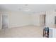 Spacious room with tile flooring, adjacent to kitchen and neutral paint at 18558 Cortes Creek Blvd, Spring Hill, FL 34610