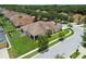 Aerial view of a lovely single-story home with a well-manicured lawn in a quiet neighborhood at 20820 Amanda Oak Ct, Land O Lakes, FL 34638
