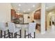 Eat-in kitchen with stainless steel appliances, granite countertops, and breakfast bar at 20820 Amanda Oak Ct, Land O Lakes, FL 34638