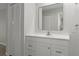 Bright bathroom with white vanity, updated fixtures and linen closet at 2152 Danforth Rd, Spring Hill, FL 34608