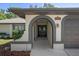 Inviting front entry showcasing a double door and direct garage access at 2152 Danforth Rd, Spring Hill, FL 34608