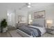 Well-lit main bedroom with walk-in closet, neutral decor and en-suite bathroom at 2152 Danforth Rd, Spring Hill, FL 34608