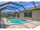 Covered pool with new brickwork, offering a private outdoor space for relaxation and recreation at 2152 Danforth Rd, Spring Hill, FL 34608