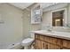Bathroom features a shower and white tile at 2169 Danforth Rd, Spring Hill, FL 34608