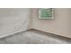 Bright bedroom with carpet, window with blind allowing plenty of natural light at 2169 Danforth Rd, Spring Hill, FL 34608