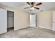 Bedroom featuring a ceiling fan and walk in closet at 2169 Danforth Rd, Spring Hill, FL 34608