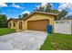 Charming single-story home with a two-car garage, a driveway, and well-maintained front yard at 2169 Danforth Rd, Spring Hill, FL 34608