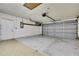 Spacious garage with high ceilings and garage door at 2169 Danforth Rd, Spring Hill, FL 34608