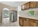 A kitchen featuring a stainless refrigerator at 2169 Danforth Rd, Spring Hill, FL 34608