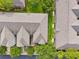 Aerial view of the property highlighting the roof and landscaping at 2209 Kings Palace Dr # 21-204, Riverview, FL 33578