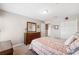 Comfortable bedroom with a dresser and carpet, offering a cozy and inviting space at 2209 Kings Palace Dr # 21-204, Riverview, FL 33578