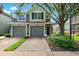 Charming townhome with a well-maintained lawn and a two-car garage, perfect for comfortable living at 2209 Kings Palace Dr # 21-204, Riverview, FL 33578