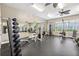 Well-equipped fitness center with modern exercise machines, free weights, and ample workout space at 2209 Kings Palace Dr # 21-204, Riverview, FL 33578