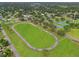 Aerial view showcasing the running track and tennis courts at 23302 Lucerne Pl, Land O Lakes, FL 34639