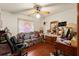 Bedroom featuring an office chair, hardwood floors and natural light at 23302 Lucerne Pl, Land O Lakes, FL 34639