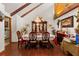 Formal dining room with hardwood floors, chandelier, and decorative accents at 23302 Lucerne Pl, Land O Lakes, FL 34639