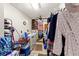 Tidy laundry room featuring washer, dryer, shelving, and lots of storage at 23302 Lucerne Pl, Land O Lakes, FL 34639