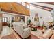 Bright and airy living room with vaulted ceilings and a comfortable seating area at 23302 Lucerne Pl, Land O Lakes, FL 34639