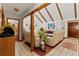Comfortable living area featuring a vaulted ceiling and an open floor plan with tile and hardwood flooring at 23302 Lucerne Pl, Land O Lakes, FL 34639