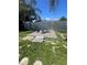 Brick fire pit and paver patio in the backyard at 3238 Coldwell Dr, Holiday, FL 34691