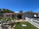 Charming single-story home with landscaped front yard and white picket fence at 3238 Coldwell Dr, Holiday, FL 34691
