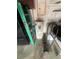 Garage features water heater, ladder, chest freezer, and some plumbing at 3238 Coldwell Dr, Holiday, FL 34691