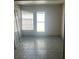 Room with a door and a window at 3238 Coldwell Dr, Holiday, FL 34691