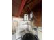 Water heater and laundry hookups in garage attic at 3238 Coldwell Dr, Holiday, FL 34691