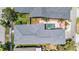 Birds-eye view of the entire residence, showcasing the pool, patio, landscaping, and neighborhood at 3450 Ferrell St, New Port Richey, FL 34655