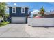 This home has a gray garage door and a private fenced backyard for outdoor enjoyment at 3450 Ferrell St, New Port Richey, FL 34655