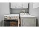 Practical laundry area featuring modern appliances for efficient laundry tasks at 3450 Ferrell St, New Port Richey, FL 34655
