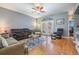 Comfortable living room boasts hardwood floors and stylish furniture at 3450 Ferrell St, New Port Richey, FL 34655