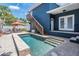 A view of the pool with stairs leading up to an elevated deck at 3450 Ferrell St, New Port Richey, FL 34655