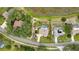 Aerial view of a beautiful single Gathering home with a screened-in pool and large yard at 364 Waterfall Dr, Spring Hill, FL 34608