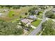 Overhead view of a beautiful residential home with a swimming pool and conservation view at 364 Waterfall Dr, Spring Hill, FL 34608